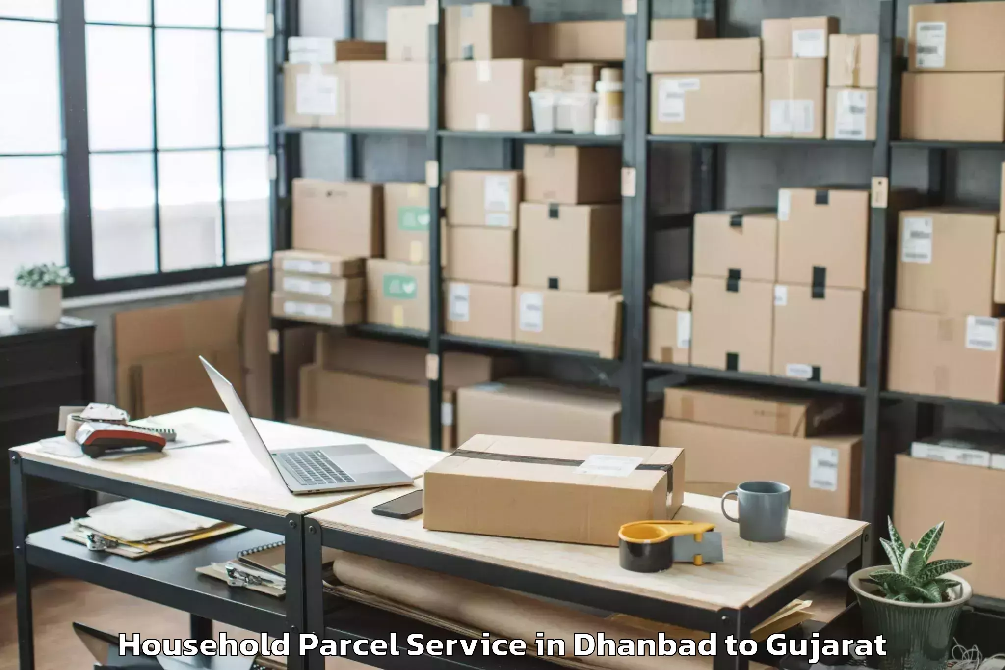 Book Your Dhanbad to Damnagar Household Parcel Today